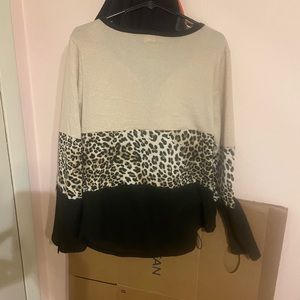Cheetah leapord print sweater. Worn twice. Perfect condition